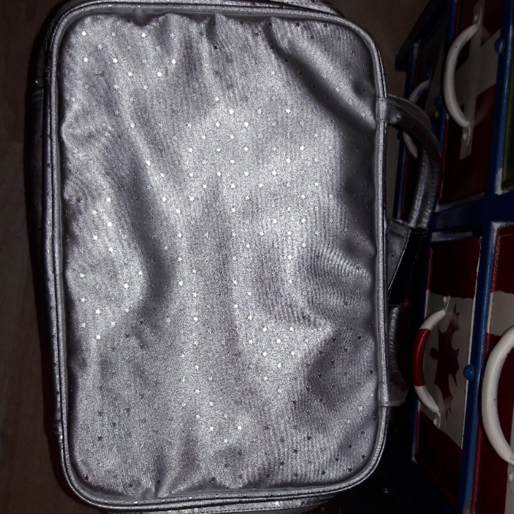 Woman's protector and Gamble cosmetics bag